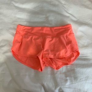 orange lululemon 2.5 speed up shorts size 6